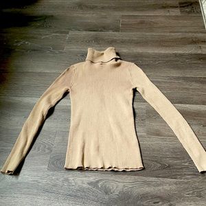 Neutral color ribbed turtle neck sweater